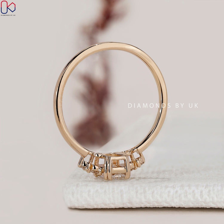 Radiant cut ring with five stone setting style.