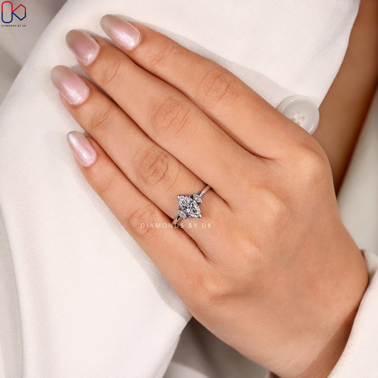 Marquise cut ring with three stone design.
