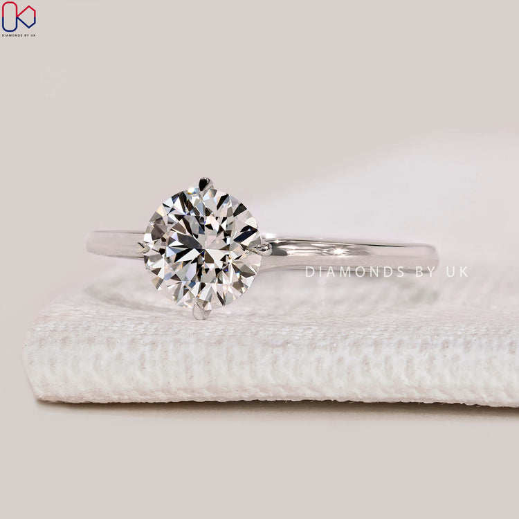 Handmade IGI Certified round cut diamond ring.
