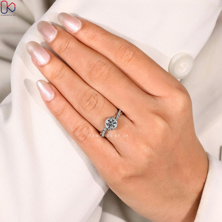 Round engagement ring with secure four prongs.
