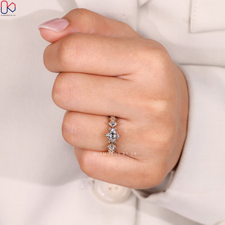 Cluster princess ring with compass prong setting.