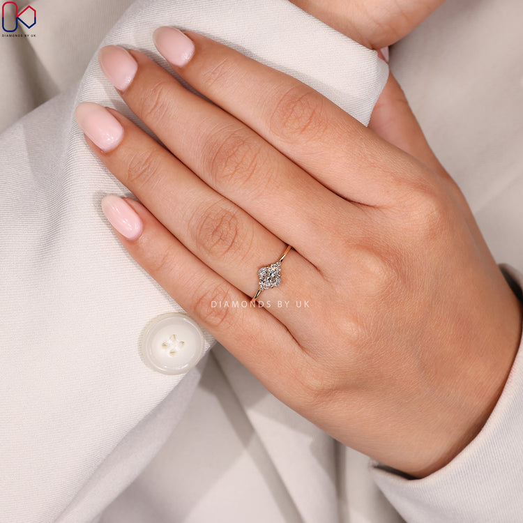 Oval cut engagement ring with side stone style.