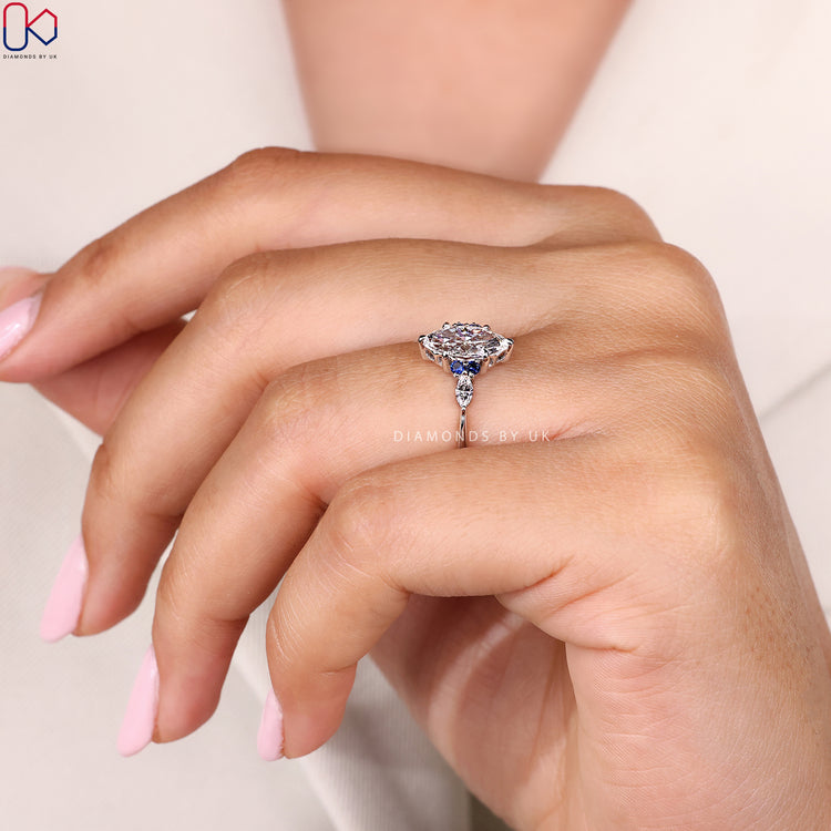 Lab grown marquise ring with tapered shank.