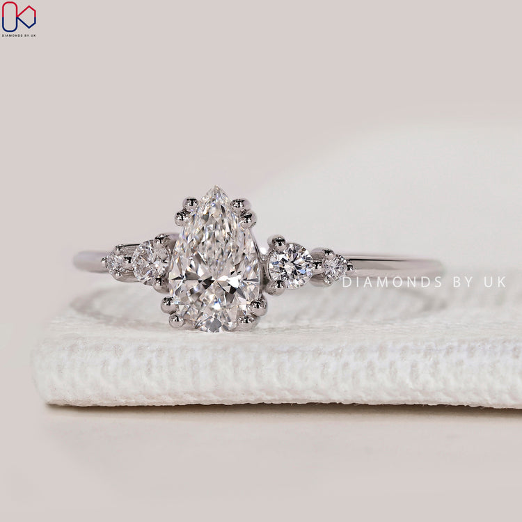 Pear cut ring with double prong five stone design.