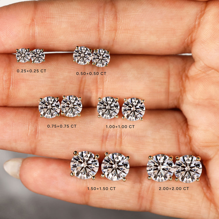Lab grown round diamond studs with four prong setting.  