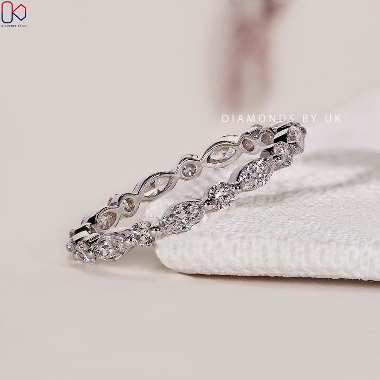 Marquise and round lab grown diamond eternity band.

