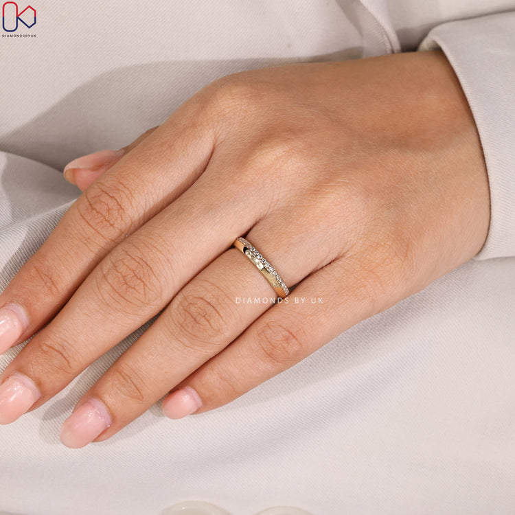 Round diamond full eternity band with knife edge style.
