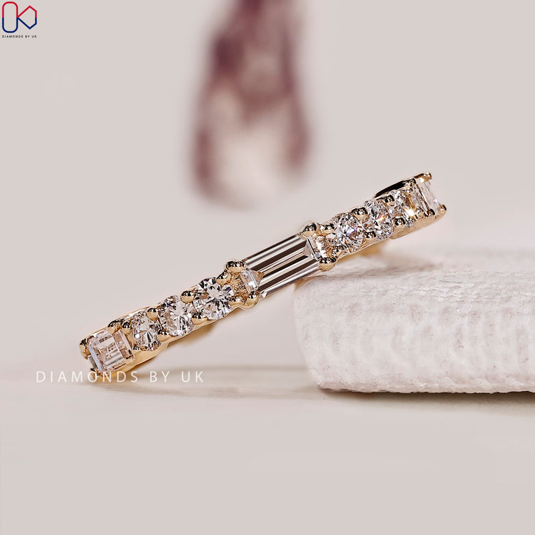 Full eternity baguette and round diamond wedding band.