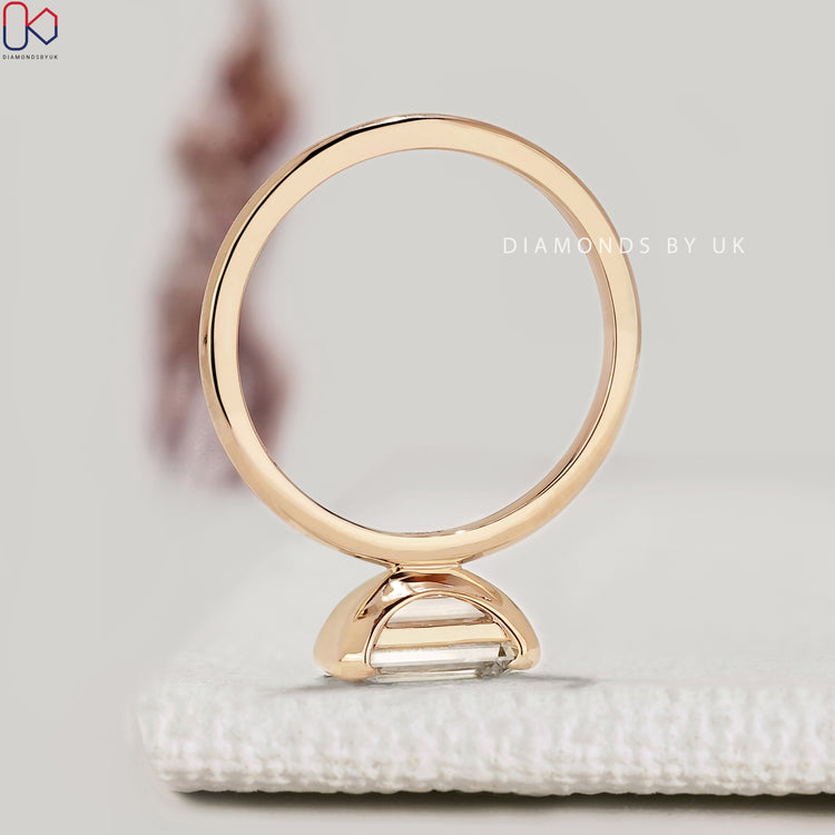 IGI certified emerald cut diamond solitaire ring

