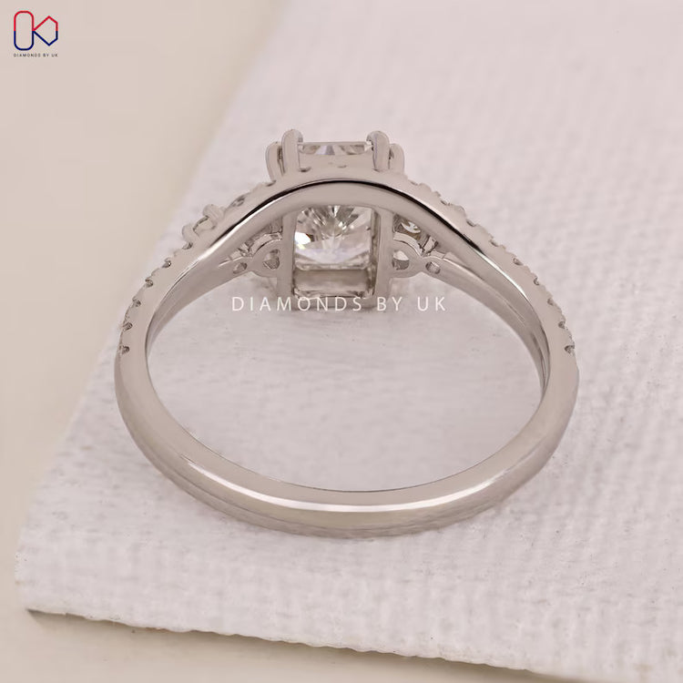 Handmade radiant engagement ring with matching wedding band.