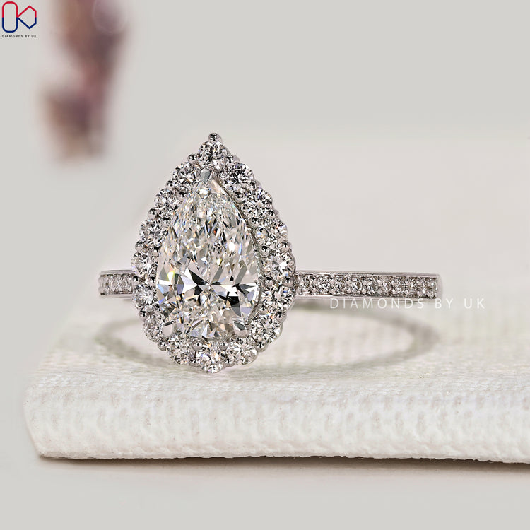 Handmade pear ring with three claw prong setting.