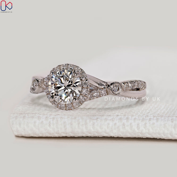 Round cut lab grown diamond ring with cathedral.
