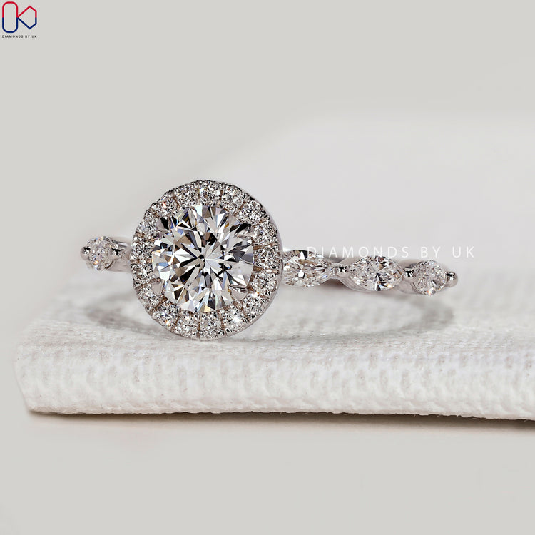 Round cut lab grown diamond ring with halo.