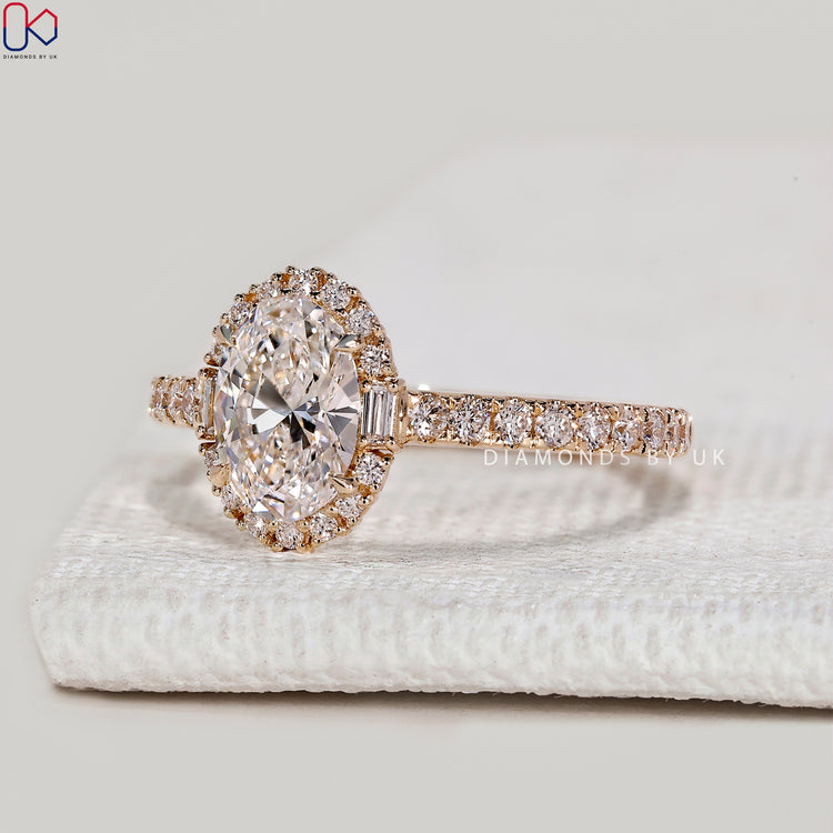 Handmade oval ring with four claw prong setting.
