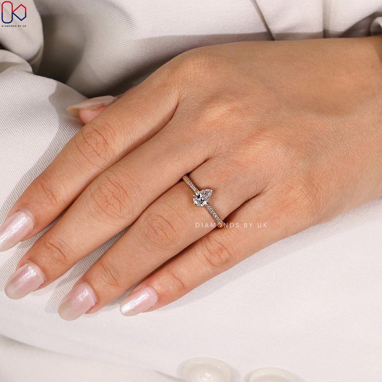 Handmade pear cut engagement ring by Diamondsbyuk.