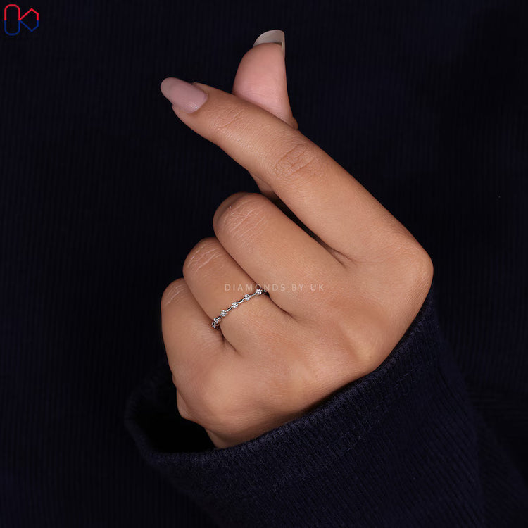 Handmade round cut diamond band with half eternity style.
