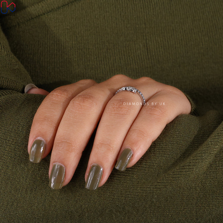 Marquise and round diamond band with half eternity style.