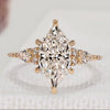 Dutch marquise diamond ring with kite and round side stones.  