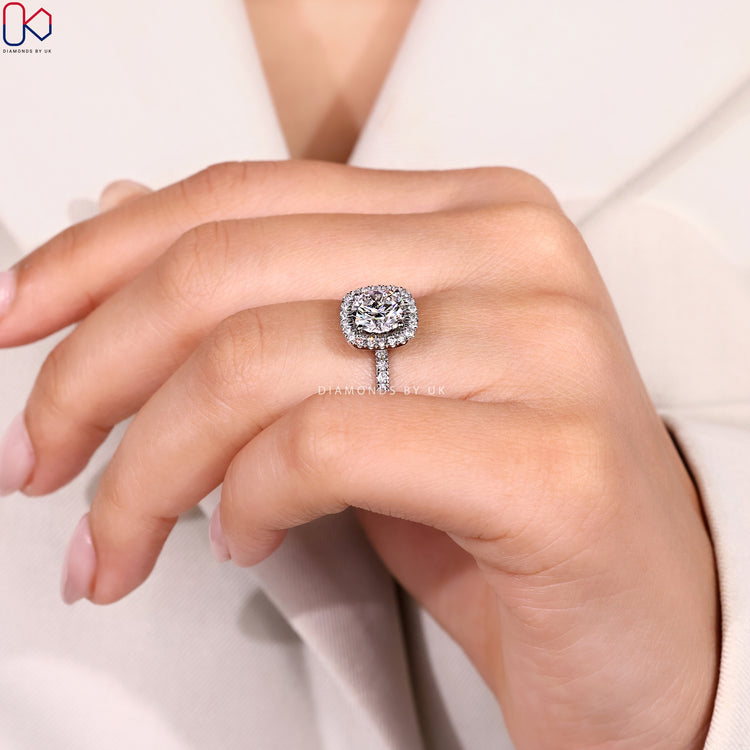 Lab grown round ring with halo and pavé style.