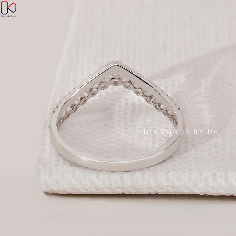 Handmade round diamond band with double row chevron.
