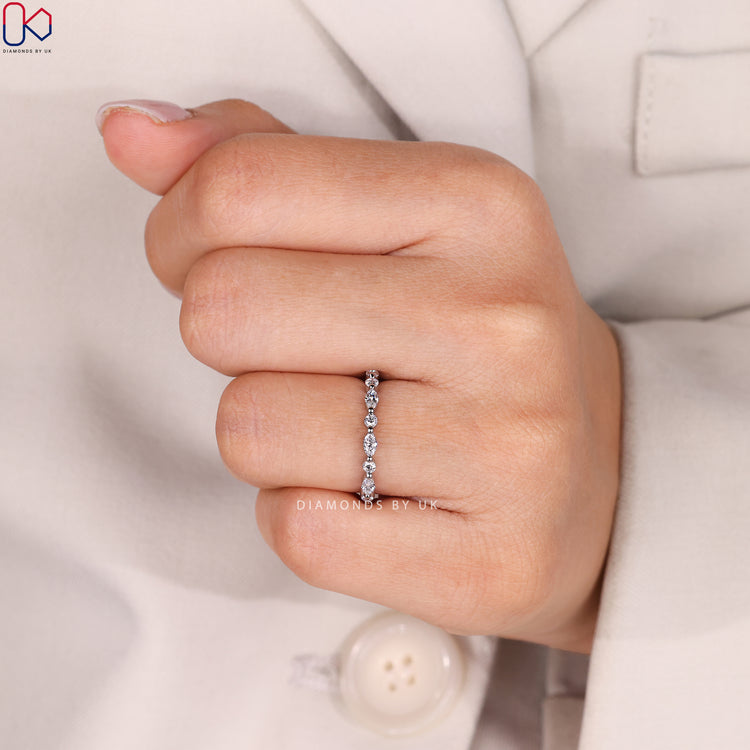 Lab grown diamond band with marquise and round diamonds.