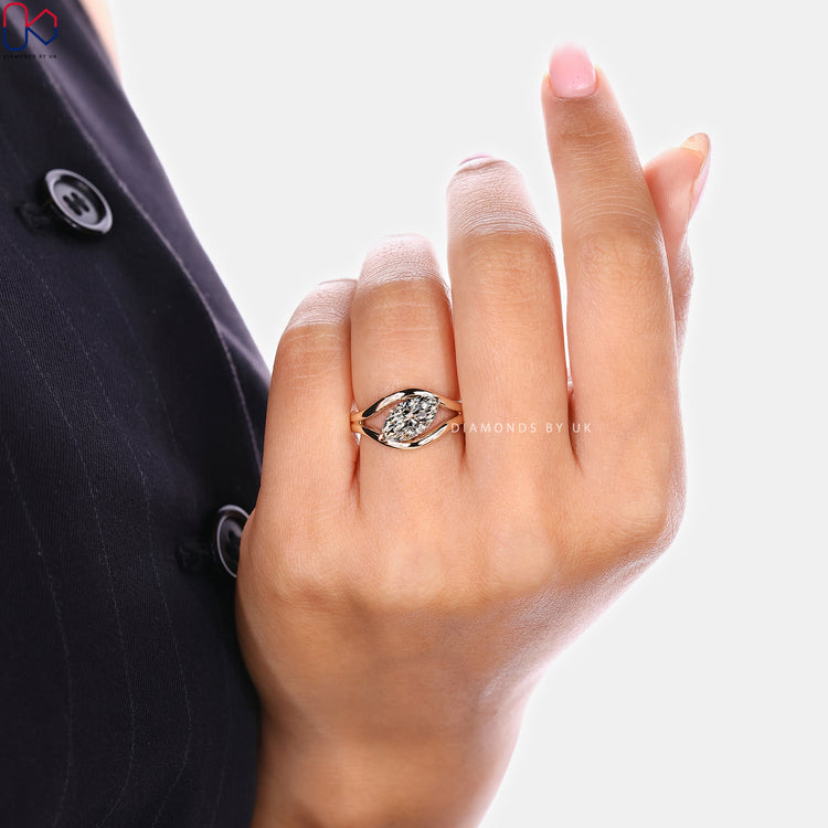 Marquise engagement ring with split shank and prong setting
