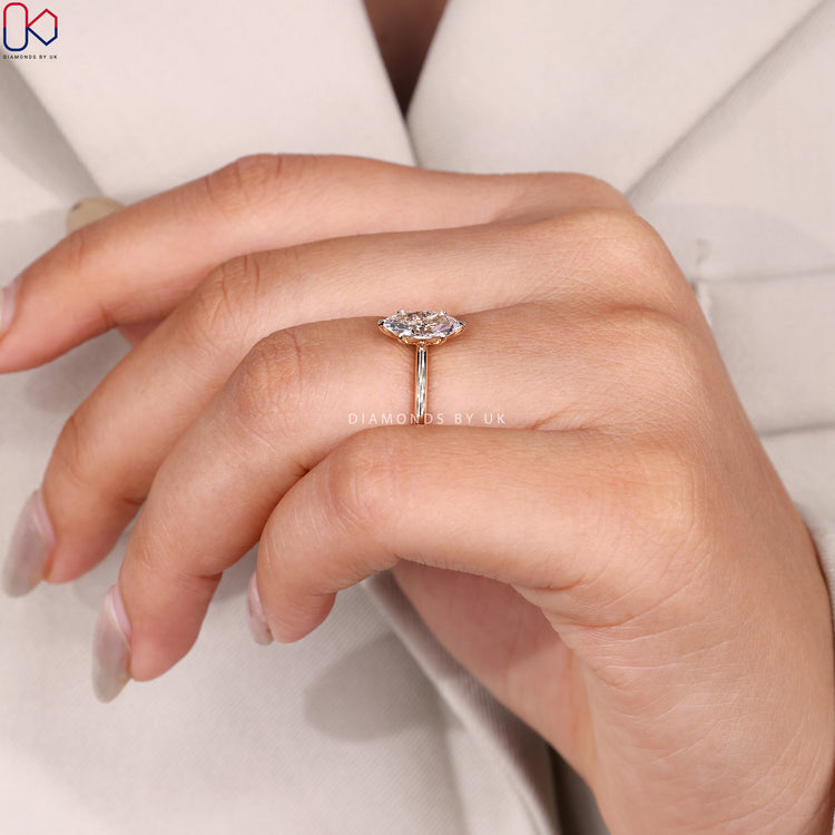 Marquise cut ring with six claw prong setting.