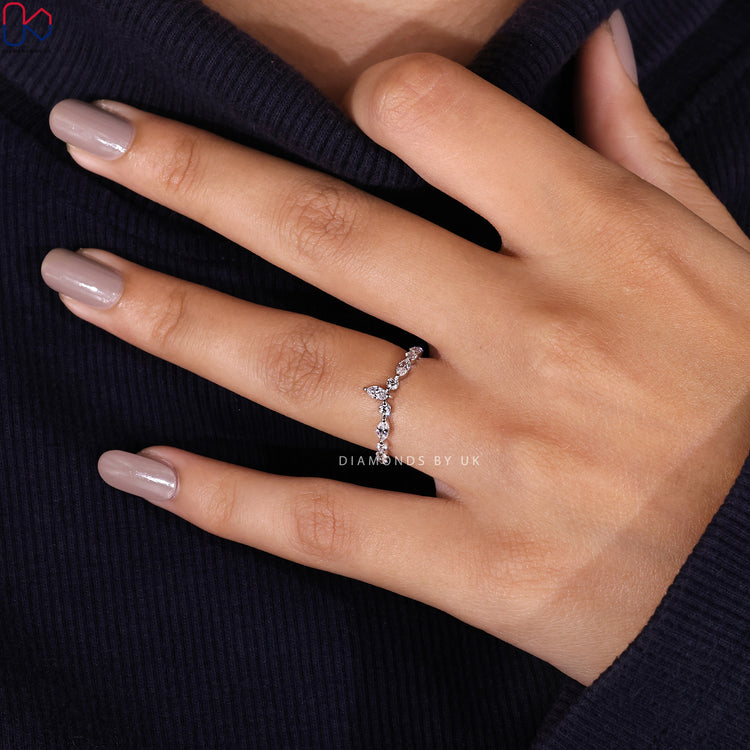 Curved marquise and round diamond band by Diamondsbyuk.
