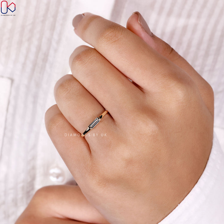 Handmade baguette diamond band with east to west setting.