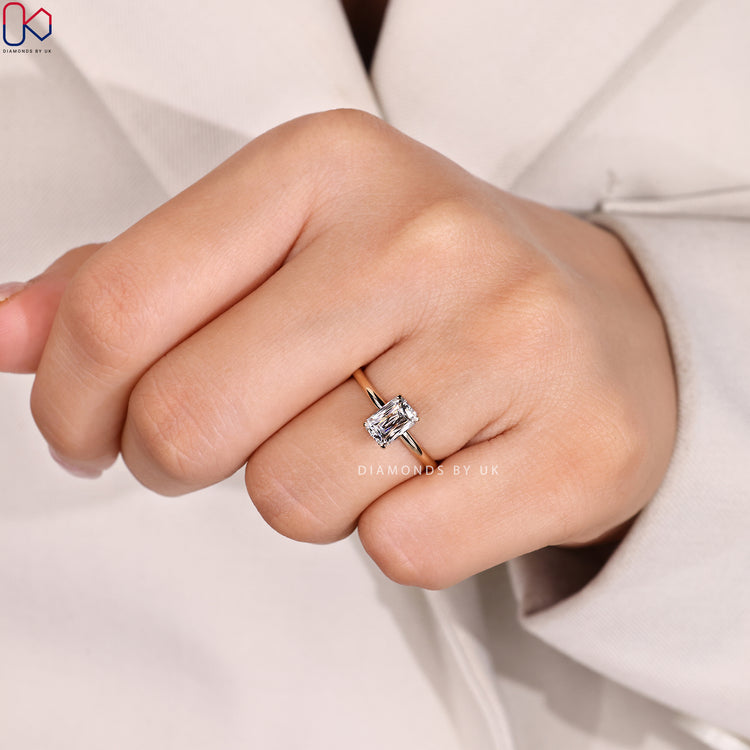 Tab prong criss cut diamond ring with solitaire style.

