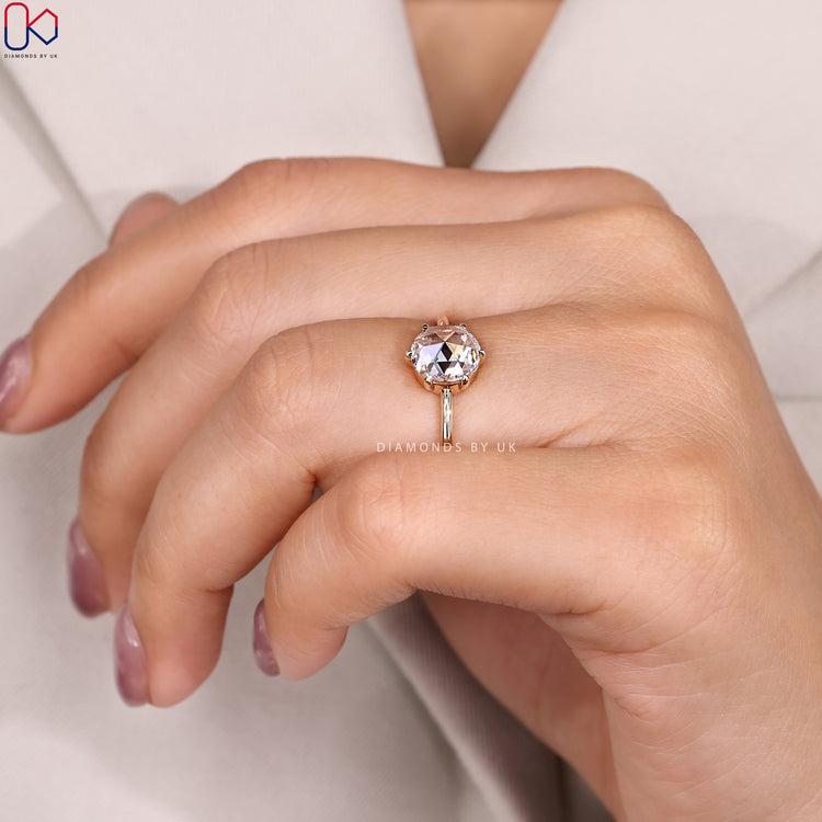 Round rose cut ring with six claw prong setting.