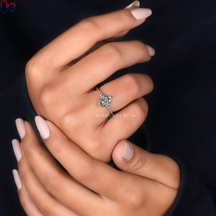 Marquise cut ring in a seven stone muse setting.