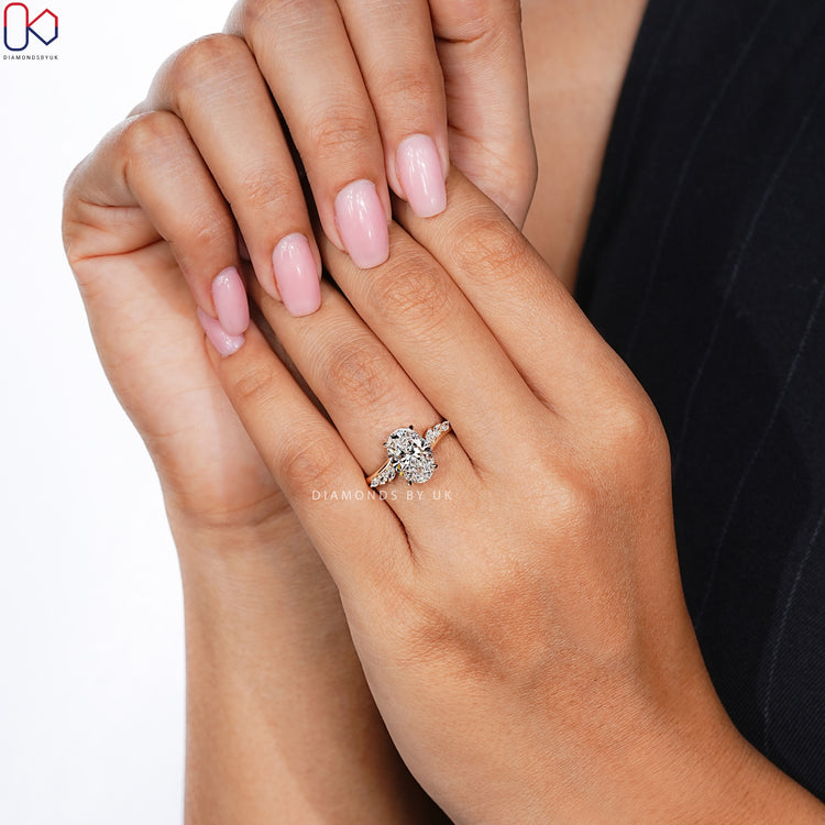 Diamondsbyuk oval ring with marquise diamond sides.
