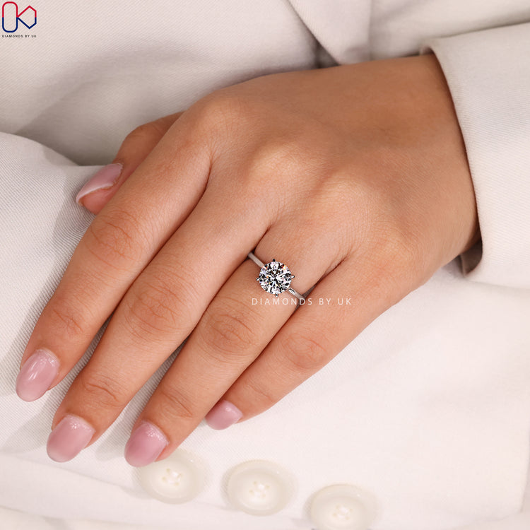 Handmade round ring with prong setting style.
