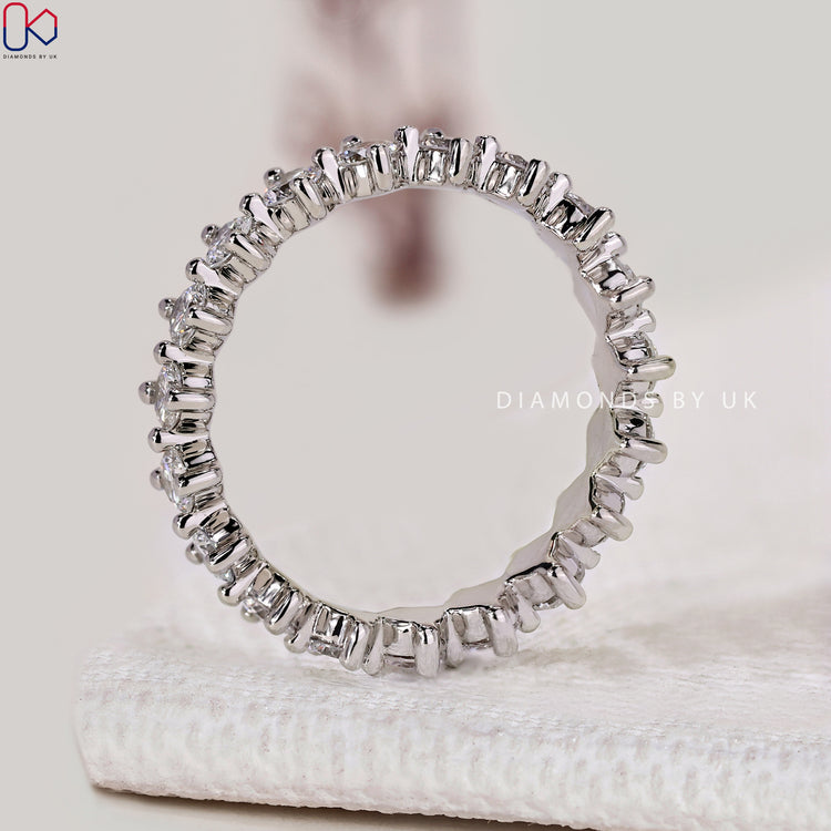 Lab grown round diamond eternity wedding band.