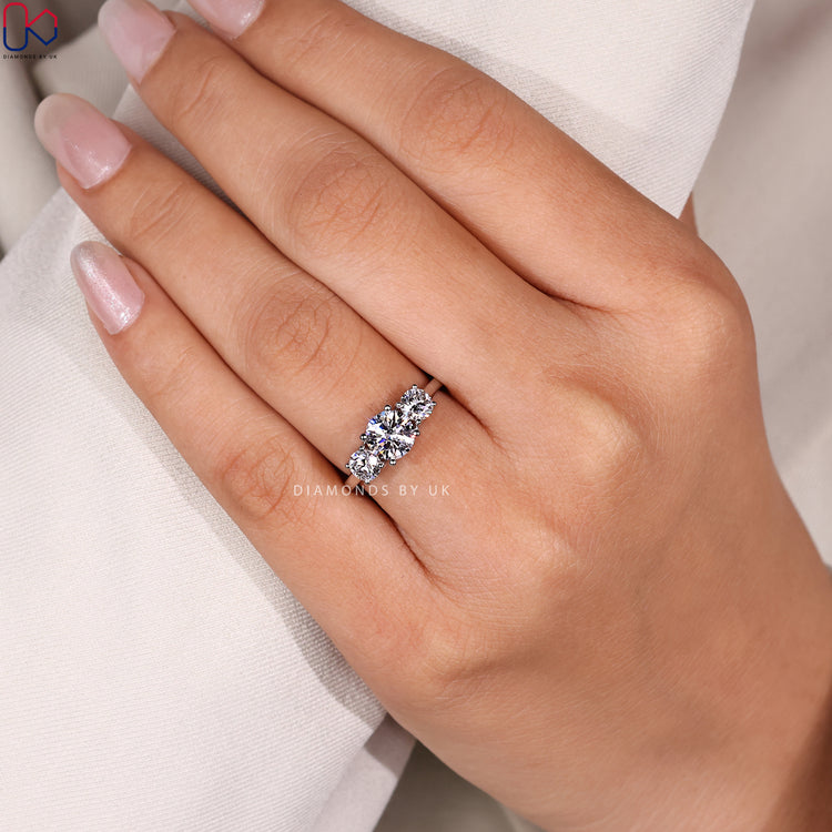 Lab grown diamond ring with side stone design.
