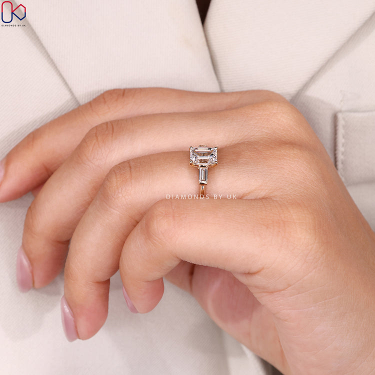Emerald cut ring with secure prong setting style.