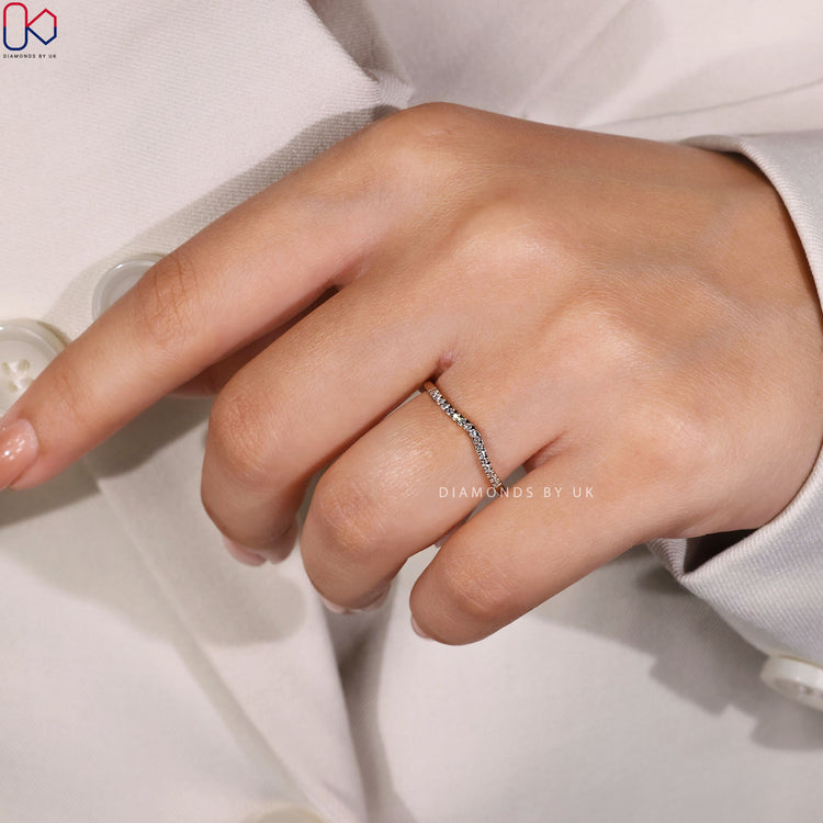 Lab grown diamond band with curved design.