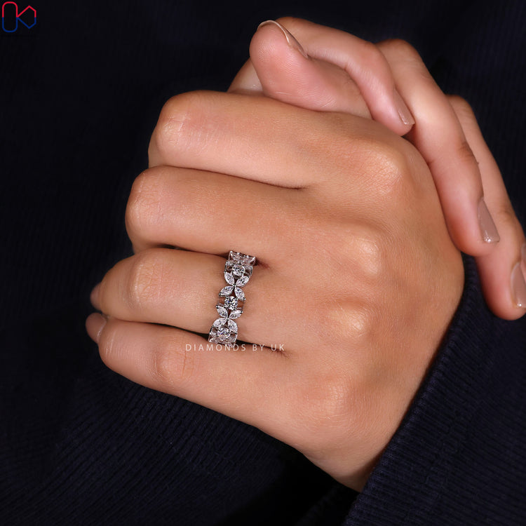 Lab grown diamond wedding band with round marquise stones.