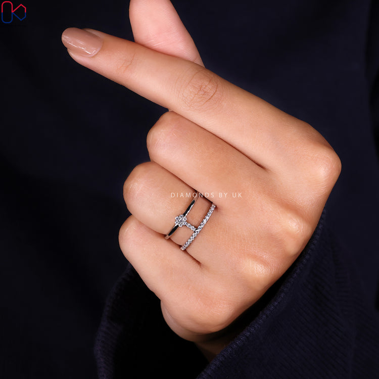Geometric round diamond wedding band by Diamondsbyuk.
