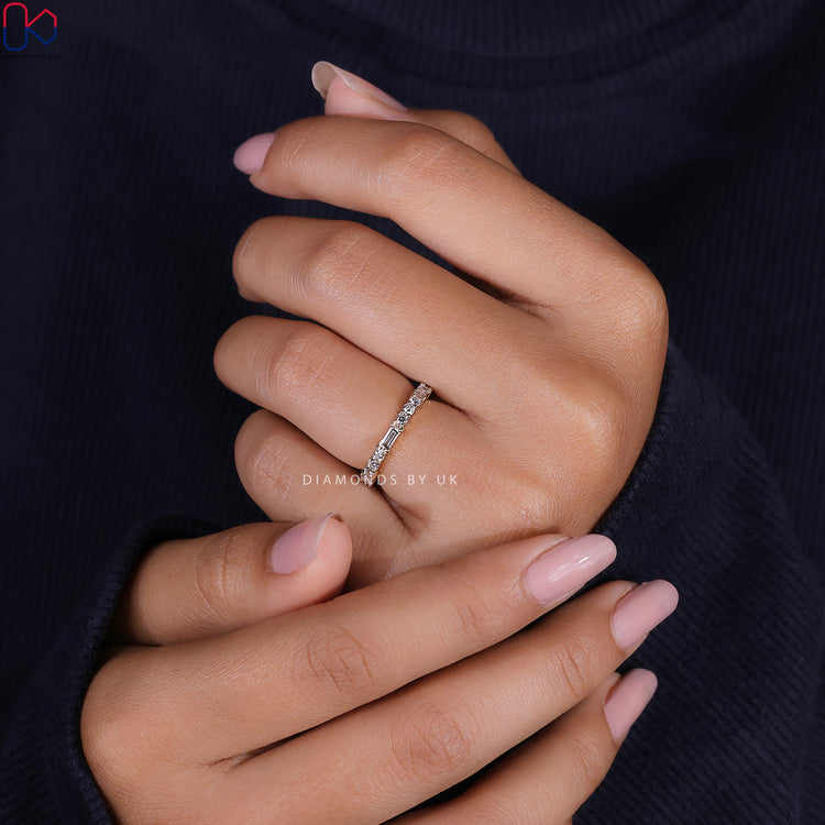Diamondsbyuk baguette and round diamond eternity band.