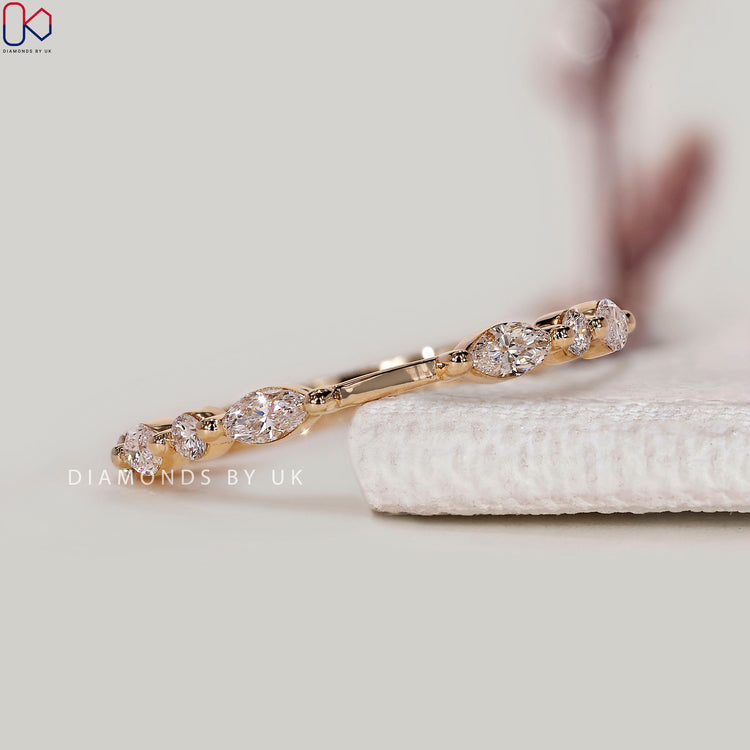 Round and marquise diamond Band with floating bubble style.