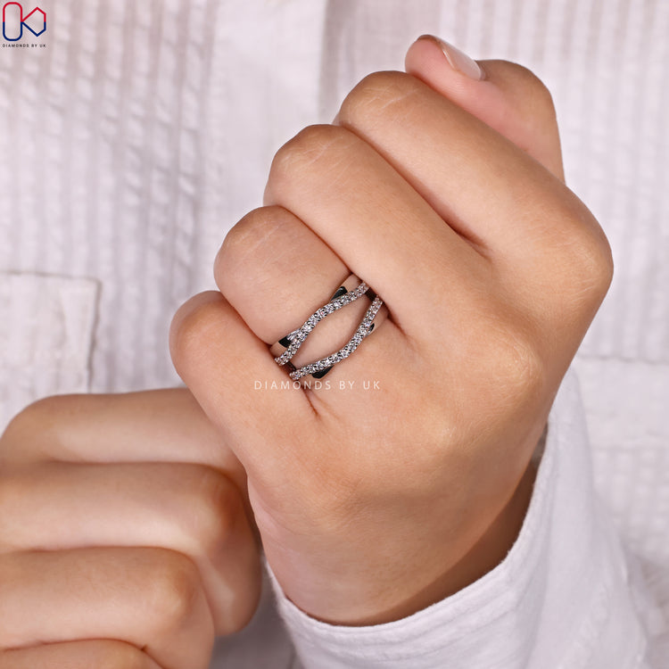 Diamondsbyuk enhancer band with round diamonds.