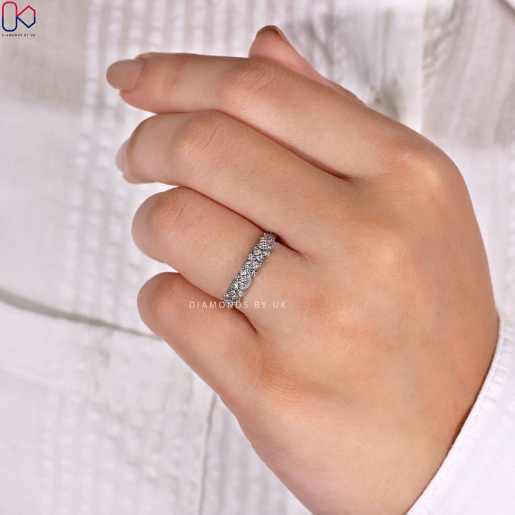 Handmade round diamond band with milgrain detailing.