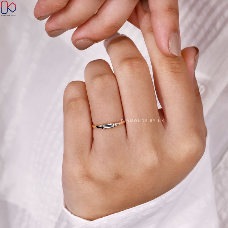 Diamondsbyuk baguette diamond band with minimalist style.