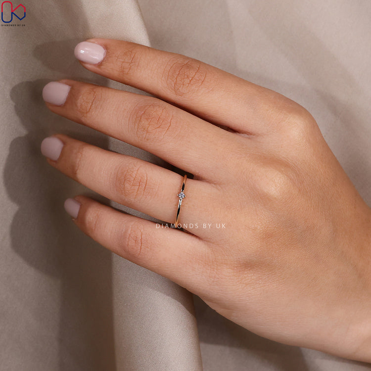 Handmade lab grown round diamond wedding band.
