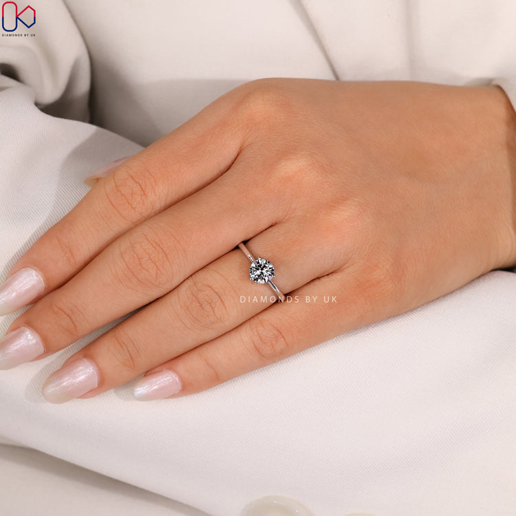 Handmade round diamond ring by Diamondsbyuk.
