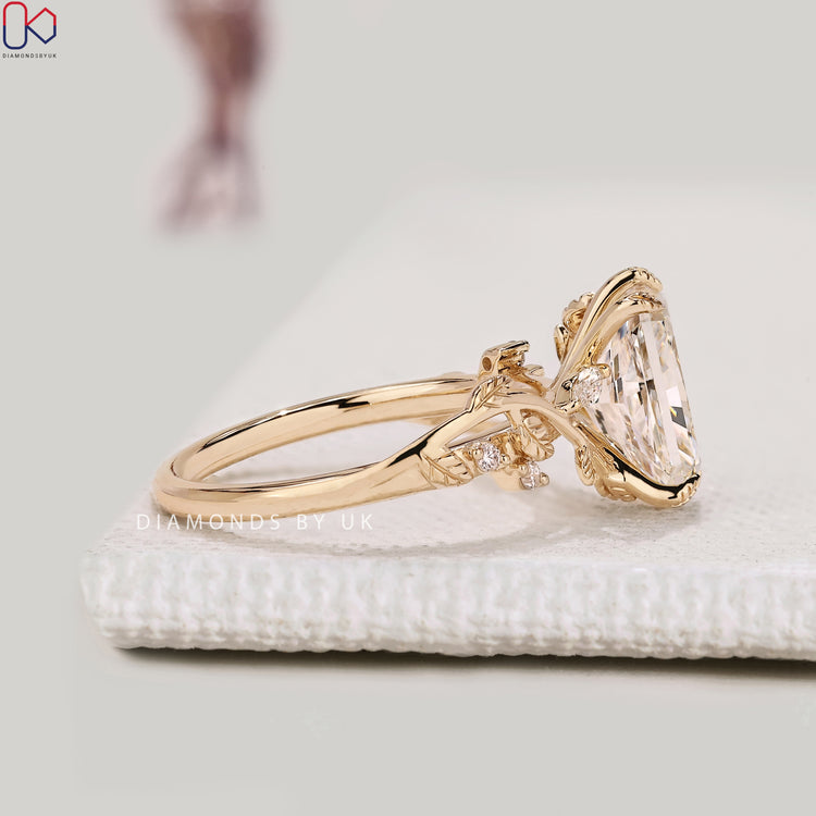 Lab grown radiant diamond ring with marquise side stones.
