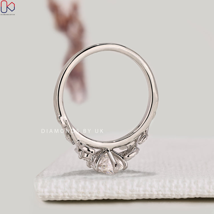 IGI certified marquise diamond ring with six claw prongs.
