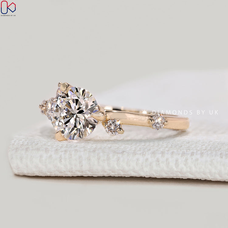 Handmade round ring with three claw prong setting.